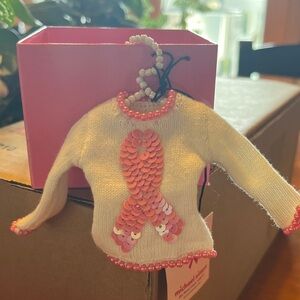 Michael Simon Cream Sweater ornament with Pink Sequin Design